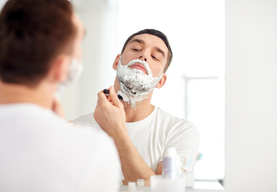 Man practicing healthy shaving tips